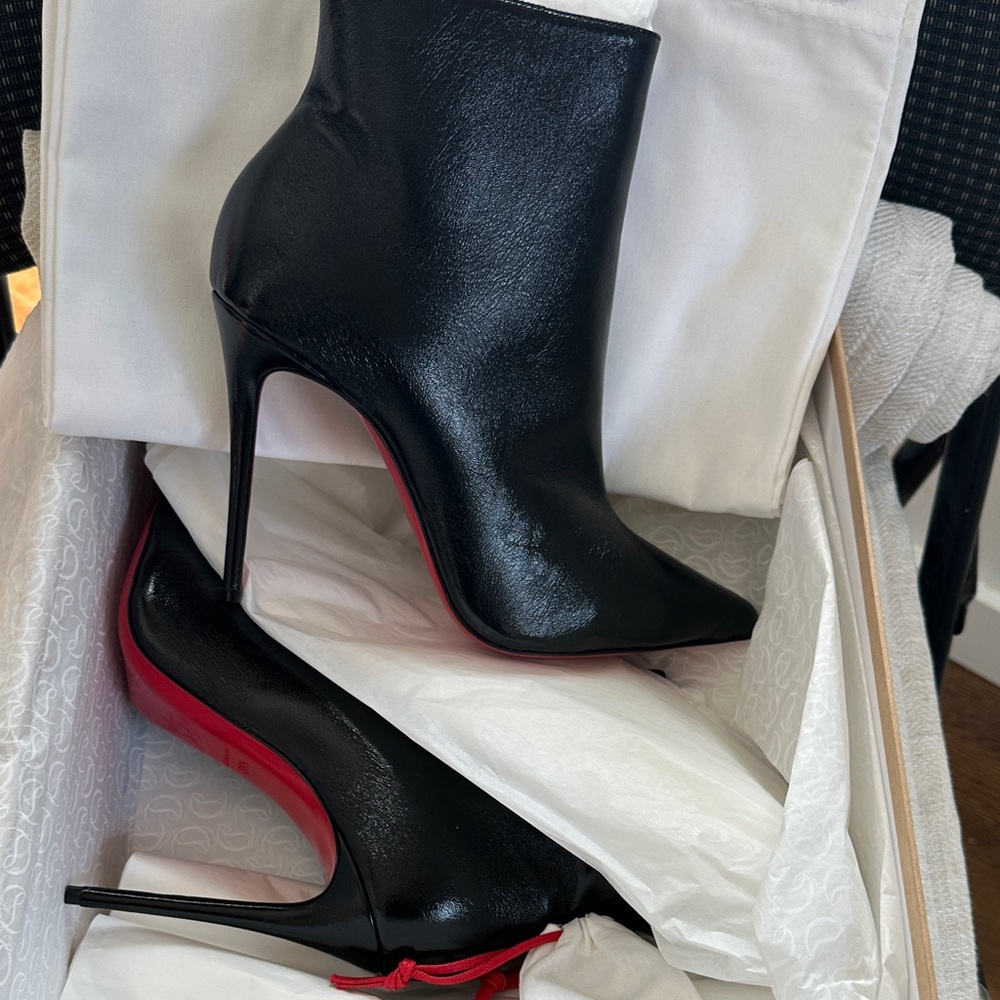 Christian Louboutin Black Heeled Boots with Red Sole